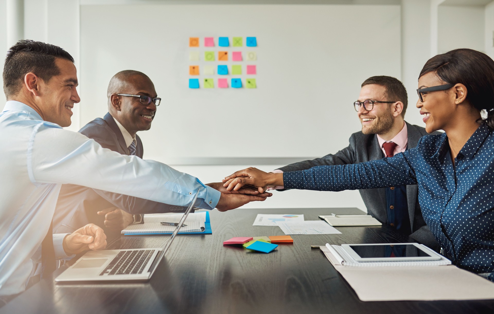 Multiracial business team show their commitment